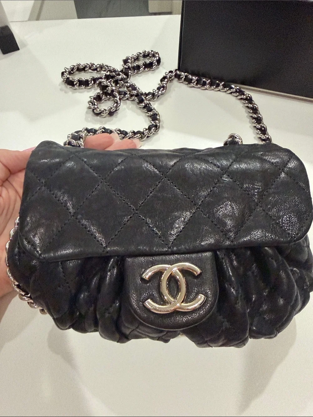 CHANEL Black Quilted leather chain around Crossbody with Silver CC Chain